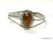 VINTAGE .925 STERLING SILVER NATIVE AMERICAN CUFF BRACELET WITH A LARGE AMBER STONE