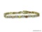 .925 STERLING SILVER AND MULTI-COLORED TOPAZ TENNIS BRACELET WITH GOLD VERMEIL