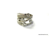 .925 STERLING SILVER AND WHITE TOPAZ DINNER RING