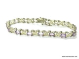 .925 STERLING SILVER AND AMETHYST TENNIS BRACELET