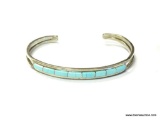 .925 STERLING SILVER AND TURQUOISE ZUNI BRACELET. SIGNED