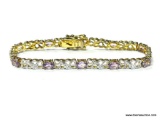 GORGEOUS .925 AND AMETHYST DIAMOND CUT TENNIS BRACELET