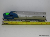 HO GAUGE BLUE AND GRAY LOCOMOTIVE. OPEN STOCK. NO BOX. AS IS.
