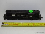 HO GAUGE PENN CENTRAL #7600 LOCOMOTIVE. OPEN STOCK. NO BOX. AS IS.