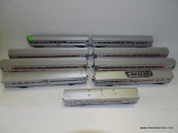 (H1) AMTRAK HO SCALE 9 ASSORTED CARS. APPEAR TO BE IN GOOD CONDITION.