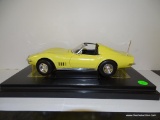 (S2) 1971 YELLOW STINGRAY CORVETTE WITH T TOPS. 1:18 SCALE. OPEN STOCK. NO BOX.