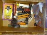 (S5) BOX LOT OF MISC. HO SCALE RAILROAD CARS WITH ISSUES. APPROX. 8 CARS. IN NEED OF REPAIR.