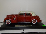 (S6) 1:18 SCALE 1937 LINCOLN TOURING CABRIOLET. RED AND WHITE. IN EXCELLENT CONDITION WITH THE BOX.