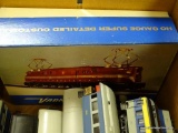 (S7) BOX LOT OF 11 HO SCALE ASSORTED CARS IN GOOD CONDITION. BOX ALSO INCLUDES 4 HO CARS THAT NEED