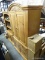 BROYHILL PINE ENTERTAINMENT CABINET. HAS PAIR OF FOLDING TOP DOORS. 2 DRAWERS. 2 LOWER PANELED