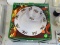 CHRISTMAS 12 PIECE PORCELAIN DINNER SET: 4 DINNER PLATES. 4 CUPS AND SAUCERS.