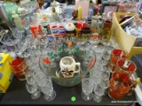 LARGE LOT OF MISC. GLASSES: HIGHBALLS. CORDIALS. SHERRY'S. BEER GLASSES. MOBANA DECANTER. VASE.