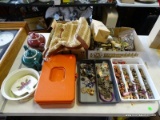 MISC. LOT: 2 UTENSIL TRAYS OF JEWELRY. BEADS THAT NEED TO BE STRUNG. NECKLACES. PINS. KEY CHAINS.