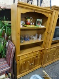 BROYHILL PINE SHELF BOOKCASE WITH 1 DRAWER AND 2 PANELED DOORS. HAS LIGHTED INTERIOR: 36