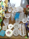 MISC. LOT OF GLASSWARE: STEMS. 2 ICE BLUE DEPRESSION JUICE GLASSES. PAIR OF CANDLE HOLDERS. 2