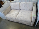 LOVESEAT SLEEPER SOFA. MISSING FEET. HAS SOME STAINING ON THE ARMS: 54