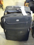DELSEY CLOTH ROLLING SUITCASE. INCLUDES CONTENTS: AMERICAN TOURISTER ROLLING LEATHER BRIEFCASE.