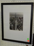 FRAMED AND MATTED PHOTO OF THE EMPIRE STATE BUILDING. IN BLACK FRAME: 17.5