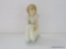 NAO BY LLADRO ARREGLANDO JARRON CON FLORES. ITEM# 1.001. 7