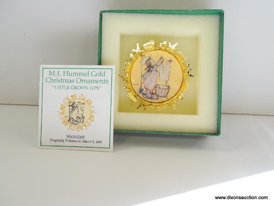 HUMMEL "LITTLE GROWN-UPS" GOLD CHRISTMAS ORNAMENT. WASHDAY. 2.5" ACROSS. IN THE ORIGINAL BOX.