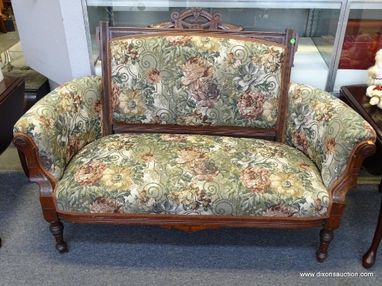 (SEC A) ANTIQUE WALNUT VICTORIAN EASTLAKE LOVESEAT WITH FLORAL TAPESTRY UPHOLSTERY. IN EXCELLENT