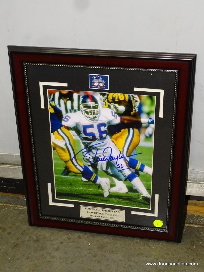 (SC) LAWRENCE TAYLOR AUTOGRAPHED PHOTO. IN CHERRY FINISH FRAME: 13"x16"