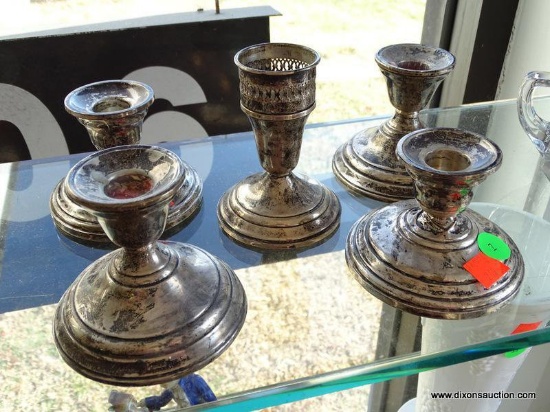 (WR) LOT OF 5 STERLING SILVER WEIGHTED CANDLE STICKS. TALLEST IS 4" TALL. AS IS.