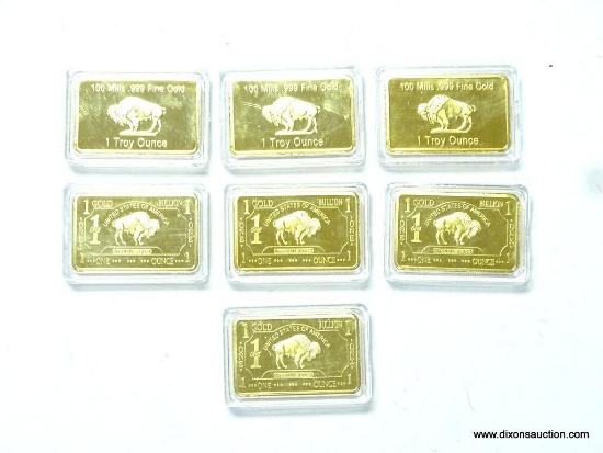 LOT OF (7) 1 OZ. GOLD BUFFALO 100 MILLS CLAD .999 24K BAR. THESE ARE PLATED BARS.