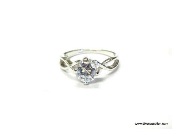 LADIES .925 STERLING SILVER & CUBIC ZIRCONIA RING WITH INFINITY INFLUENCED BAND. THIS RING IS AN