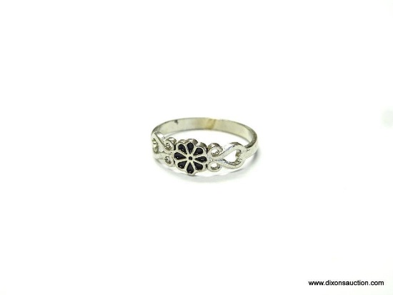 LADIES .925 STERLING SILVER FLOWER DESIGNED RING. THIS RING IS AN APPROX. SIZE 4-3/4
