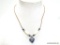 BLUE AND WHITE STONE HEART PENDANT NECKLACE. 18