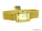 NEW WITH TAGS PAULO MEN'S QUARTZ WATCH DESIGNED BY PAULO GUCCI. MODEL# 446C. PRICE TAG ON THE WATCH