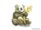 VERY NICE DESIGNER PANDA BROOCH OR PIN. PANDA BEAR HOLDING GOLD TONE BAMBOO PLANT. SIGNED ON THE