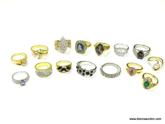 Lot of 15 rings right out of the jewelry box. Very pretty high fashion rings, look great