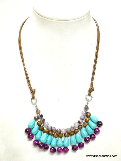 TURQUOISE DROP BEAD PENDANT NECKLACE FEATURES A TOP ROW OF LAVENDER JADE BEADS, THEN WOODEN BEADS,