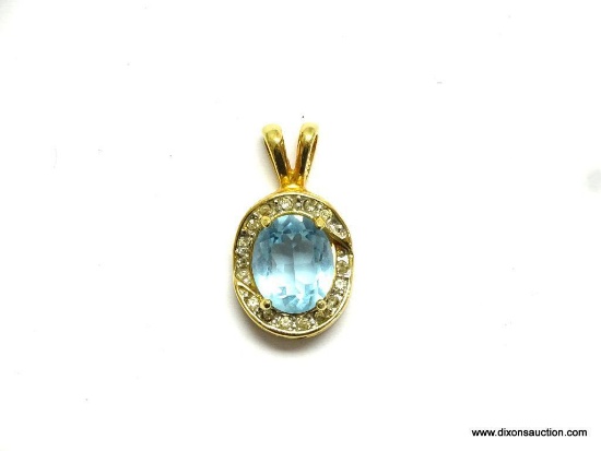 GOLD VERMEIL BLUE TOPAZ AND CRYSTAL OVAL PENDANT. 1" LONG. 5/8" ACROSS. BRING YOUR OWN CHAIN. TOPAZ