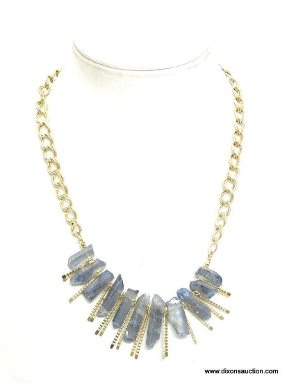 VERY NICE BLUE ATOMIC CRYSTAL GOLD TONE NECKLACE. HAS 11 BLUE CRYSTALS. 19" LONG. HAS 3" EXTENDER.