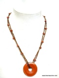 CAROLINA HERRERA SIGNED CORAL DISC BEADED NECKLACE. 20