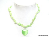 PERIDOT COLOR STONE CHIP NECKLACE WITH MATCHING HEART PENDANT. FEATURES A BARREL SCREW CLASP FOR