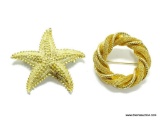 2 GOLD TONE BROOCHES. 1 IS WOVEN CIRCLE PIN AND THE OTHER IS A STARFISH BROOCH. CIRCLE PIN 1 5/8