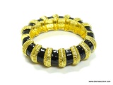 VERY NICE QUALITY BLACK AND GOLD MAGNETIC CLASP HINGED BANGLE BRACELET. 2.25