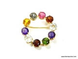 18K Gold Multi-Color Gemstone Antique Circle Pin. Measures 1.25