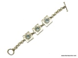 BEAUTIFUL ROLO LINK TOGGLE CLASP BRACELET WITH 3 HAMMERED SQUARE PANELS SET WITH LIGHT BLUE STONES.