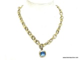 Premier Designs signed alternating gold and silver tone link statement necklace with blue stone