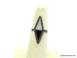 NATIVE AMERICAN STERLING SILVER BLACK ONYX AND MOTHER OF PEARL STERLING SILVER RING. CURRENTLY SIZED