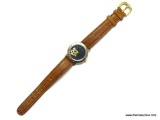 AUTHENTIC FOSSIL LADIES WATCH WITH ORIGINAL FOSSIL LEATHER BAND. THIS WATCH HAS 18 FLOATING DISKS