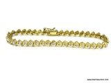 STERLING SILVER WITH GOLD VERMEIL TENNIS BRACELET. 7.5