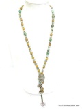 ROXANN DESIGNED BOHO NECKLACE DECORATED WITH STONE BEADS AND HAS A VINTAGE AIR FORCE MUSEUM CHARM AT