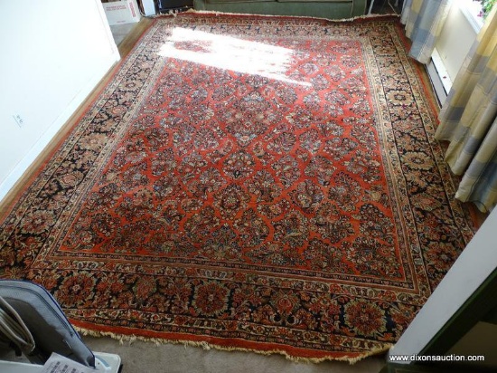 (LR) LARGE ROOM SIZE ORIENTAL RUG. HANDMADE. APPROX. 10FT 10 IN BY 13FT 4IN. GOOD USED CONDITION.