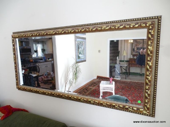 (LR) VERY LARGE MID CENTURY BEVELED GLASS MIRROR. 64"X31"X3".